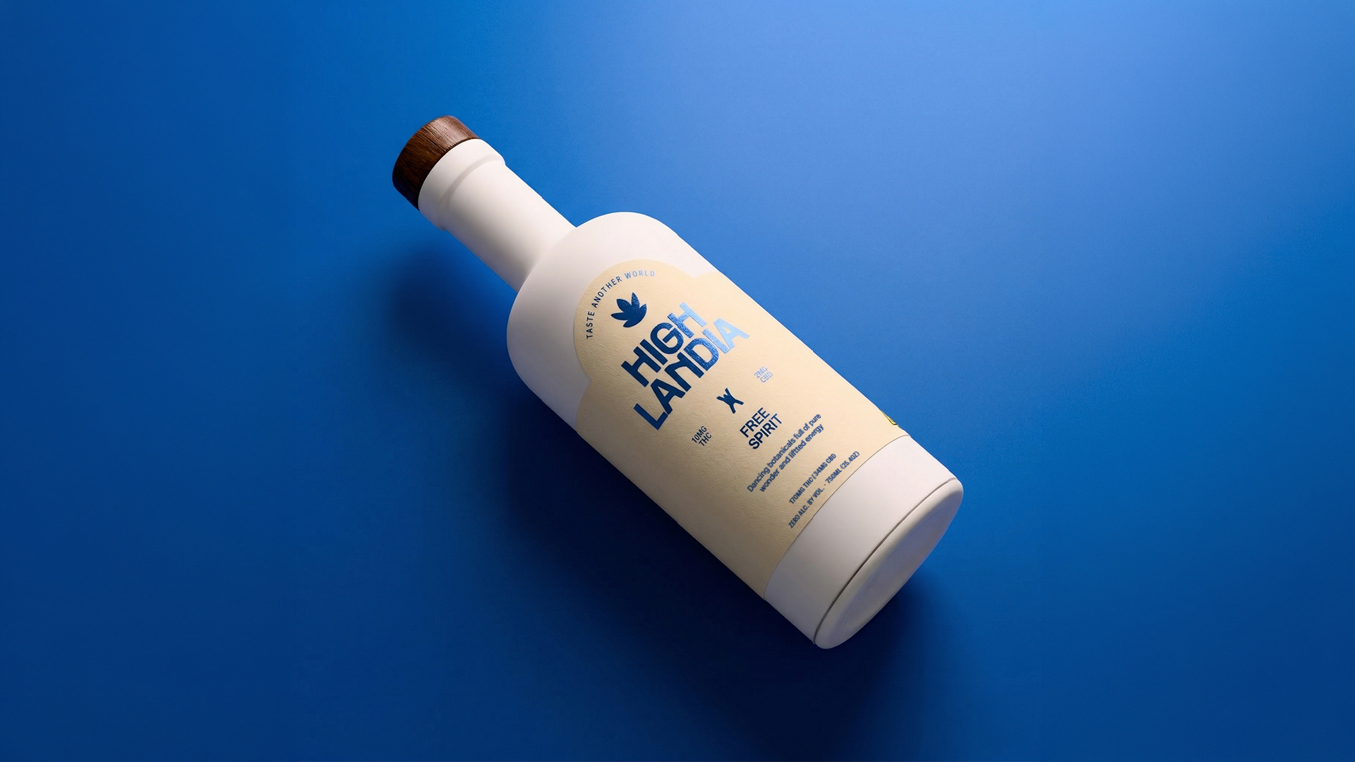 Cream colored Highlandia THC drink bottle on a cobalt blue surface